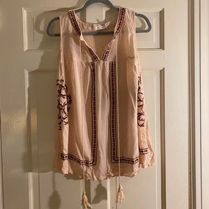 tasseled tank with embroidered detailing